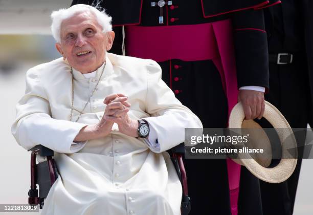 June 2020, Bavaria, Freising: The emeritus Pope Benedict XVI arrives at Munich Airport to board his plane. The Pope emeritus travels back to the...