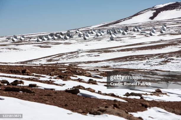 Radio telescope antennas at the Atacama Large Millimeter/submillimeter Array are seen afar, on July 11, 2013 at the Chajnantor Plateau, Chile. The...