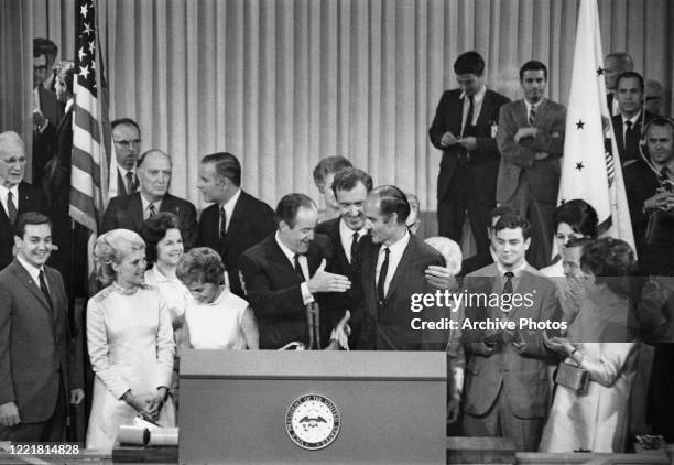 American politician Hubert Humphrey and defeated nominee, American politician George McGovern , shake hands after Humphrey had been nominated as the...