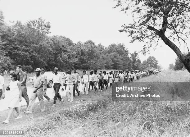 Participants on the grass verge alongside Highway 51 taking part in the 220-mile March Against Fear from Memphis, Tennessee, to Jackson, Mississippi,...