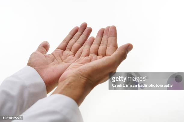 close up shot for hand praising - muslim prayer stock pictures, royalty-free photos & images