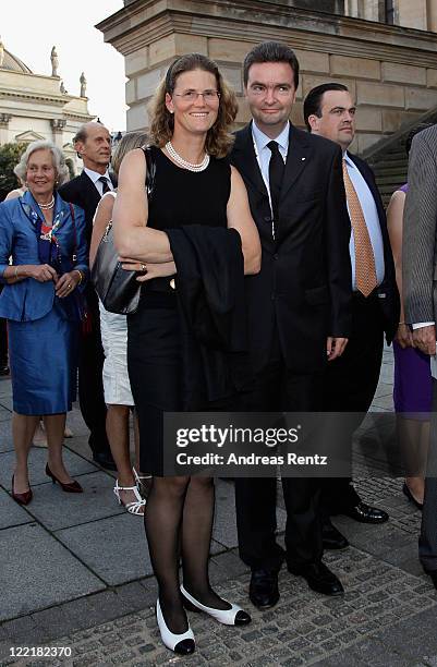 Georg von Habsburg - Lothringen and wife Eilika Habsburg - Lothringen Duchess of Oldenburg arrive for a charity concert at the Gendarmenmarkt concert...