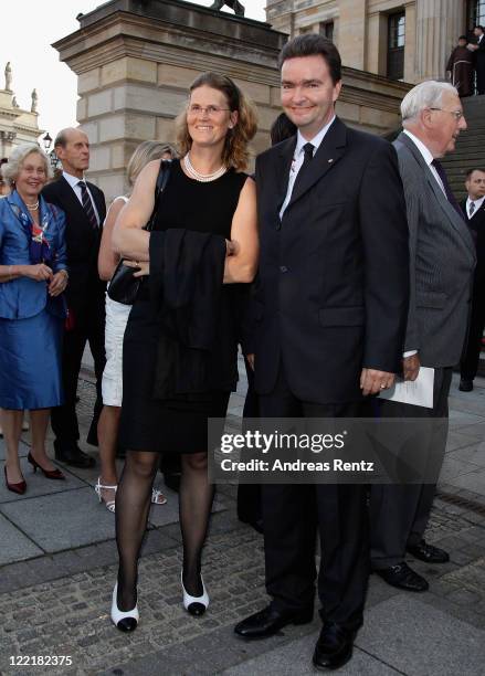 Georg von Habsburg - Lothringen and wife Eilika Habsburg - Lothringen Duchess of Oldenburg arrive for a charity concert at the Gendarmenmarkt concert...