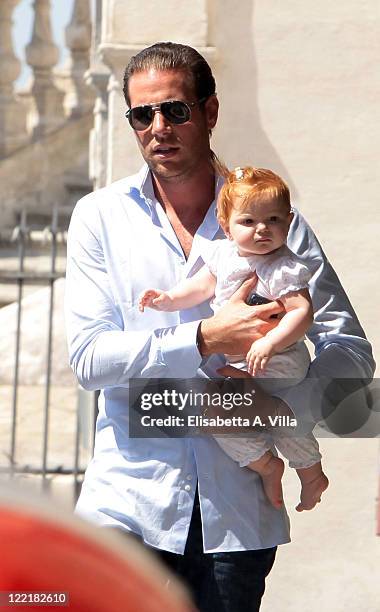 Pierre Ladow and Chiara Ladow arrive at the Hassler Hotel ahead of the wedding of Petra Ecclestone and James Stunt on August 26, 2011 in Rome, Italy.