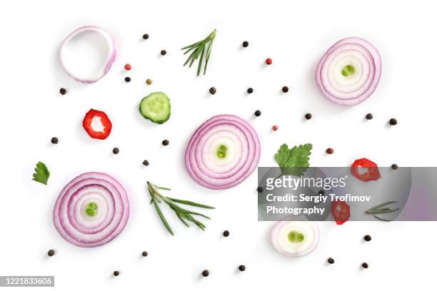 flat lay slices of red onion with rosemary and parsley - red onion white background stock pictures, royalty-free photos & images