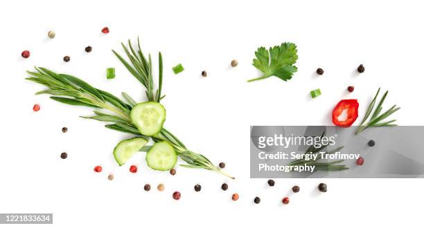 green herbs and pepper corns on white, food background - ingredients on white ストックフォトと画像