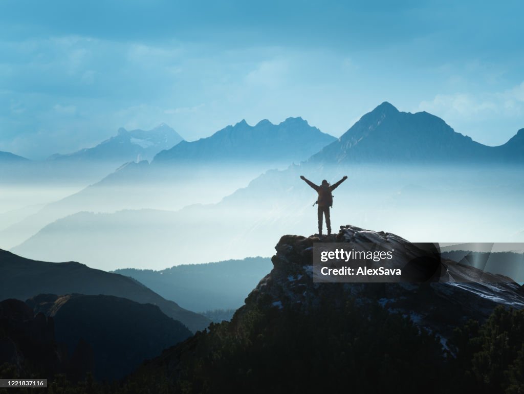 Positive man celebrating success