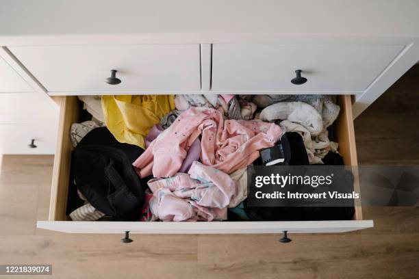 clothing organized by color before and after - wardrobe organisation stock pictures, royalty-free photos & images