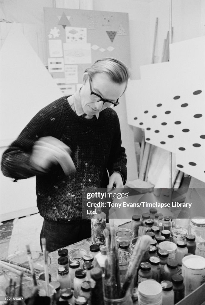 British abstract artist Jeremy Moon at work in a studio, circa 1965 ...