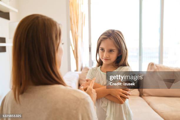 conflict between mother and daughter - repreensão imagens e fotografias de stock