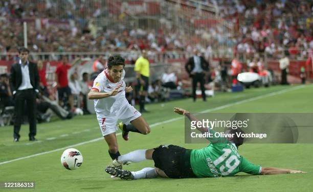 Foul from Christian Schulz on Jesus Navas during the UEFA Europa League Play-Off second leg match between FC Sevilla and Hannover 96 at Estadio Ramon...
