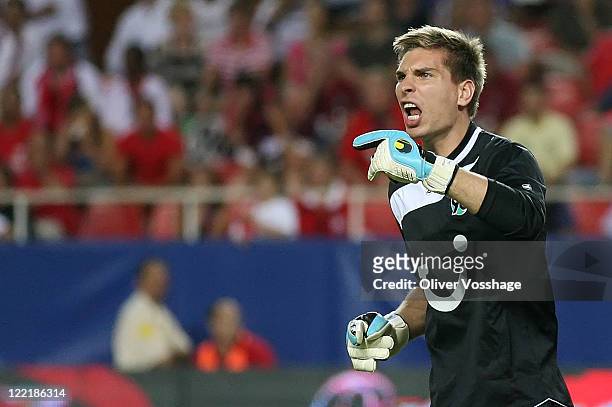 Keeper of Hannover 96 Zieler shouting to the Defense players to stay correct in the Wall during the UEFA Europa League Play-Off second leg match...