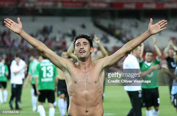 Karim Haggui waving to the Fans after the UEFA Europa League Play-Off second leg match between FC Sevilla and Hannover 96 at Estadio Ramon Sanchez...
