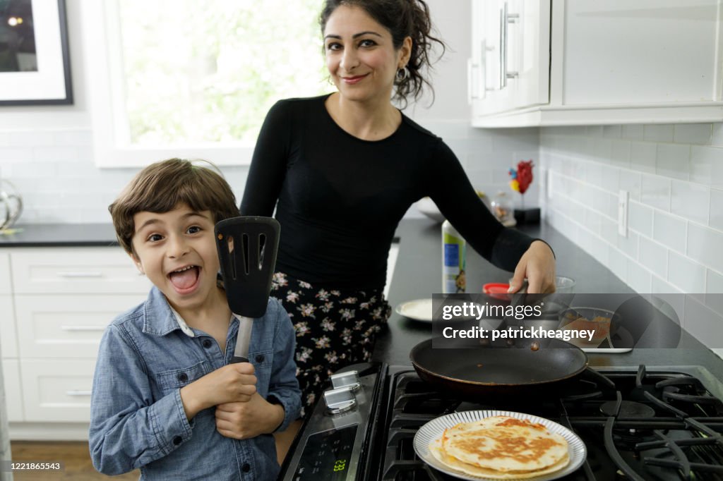 Little Boy Learns to Cook