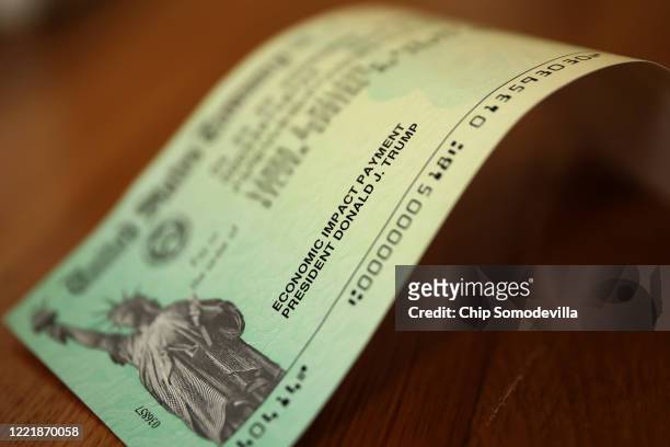President Donald Trump's name appears on the coronavirus economic assistance checks that were sent to citizens across the country April 29, 2020 in...