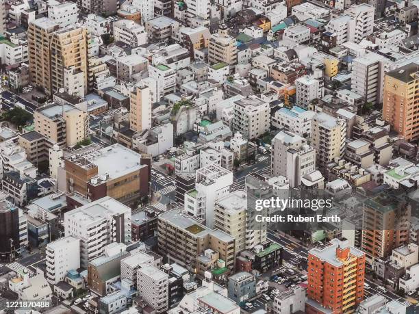 apartment buildings on a tokyo city district aerial view. - demographic overview stockfoto's en -beelden