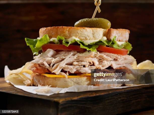 turkey and cheddar cheese blt with potato chips - blt sandwich imagens e fotografias de stock