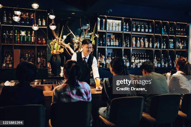 crowded taiwanese cafe after lockdown - crowded bar stock pictures, royalty-free photos & images