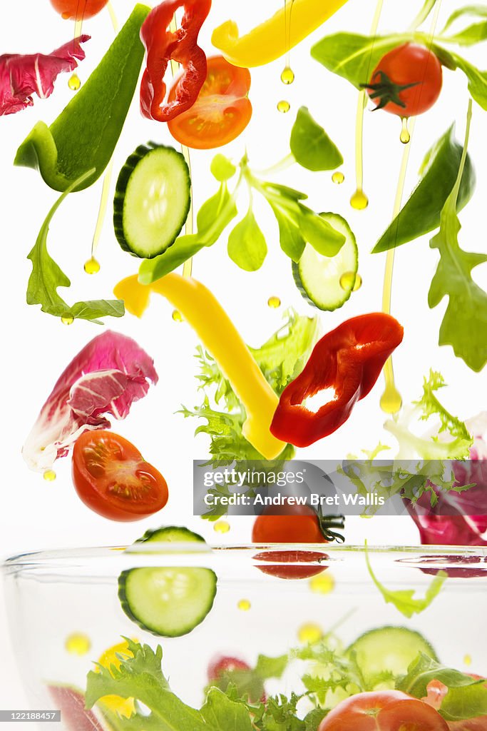 Fresh salad vegetables with olive oil