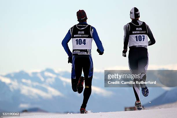 Axel Reiser of New Zealand and Andy Pohl of New Zealand compete in the Winter Triathlon during day 15 of the Winter Games NZ at Snow Farm on August...