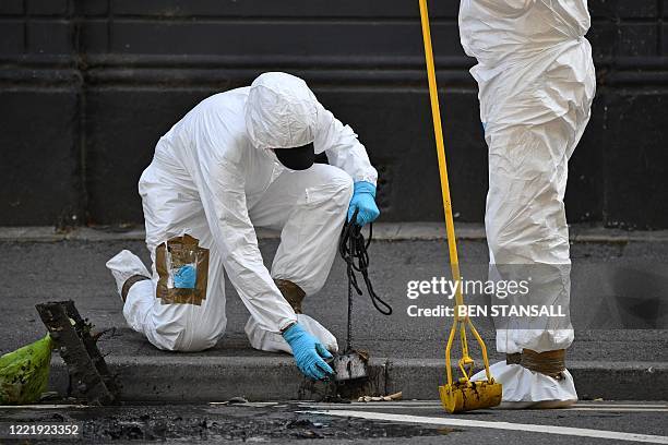 Ppe In Police Tyvek Photos and Premium High Res Pictures - Getty Images