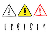 Set of warning hand drawn signs with exclamation mark, doodle style, isolated on white background, vector illustration