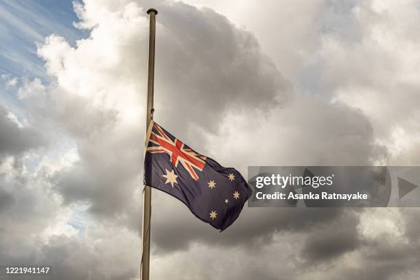 The Australian flag flying at half mast at the Richmond Police station on April 30, 2020 in Melbourne, Australia. Leading Senior Constable Lynette...