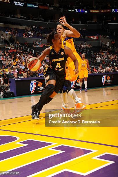Amber Holt of the Tulsa Shock drives to the basket against the Los Angeles Sparks at Staples Center on August 26, 2011 in Los Angeles, California....