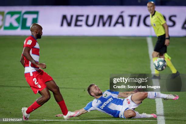 Dimitri Foulquier of Granada, Kevin Rodrigues of Leganes during the La Liga Santander match between Leganes v Granada at the Estadio Municipal de...