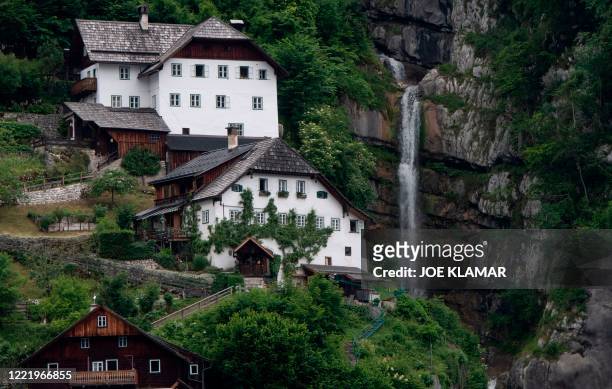 View of the Hallstatt village, a World Heritage-listed town on Lake Hallstatt's western shore in Austria's mountainous Salzkammergut region in...