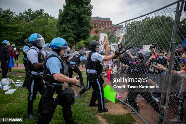 Protesters clash with U.S. Park Police after protesters attempted to pull down the statue of Andrew Jackson in Lafayette Square near the White House...
