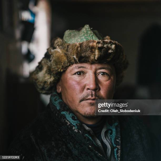 portrait of mongolian man - mongolian culture stock pictures, royalty-free photos & images