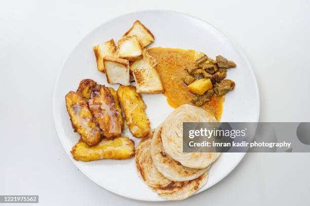 fried bananas ,roti canai and curry - roti canai stock pictures, royalty-free photos & images