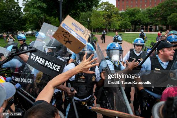 Protesters clash with U.S. Park Police after protesters attempted to pull down the statue of Andrew Jackson in Lafayette Square near the White House...