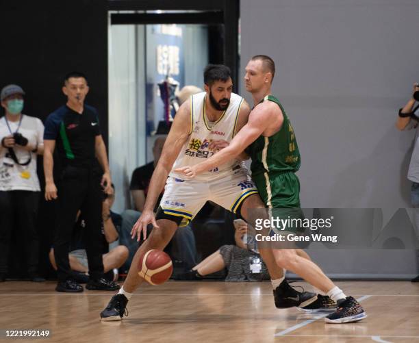 Sim Bhullar of Yulon Luxgen Dinos attempts low post during the SBL Finals Game Six between Taiwan Beer and Yulon Luxgen Dinos at Hao Yu Trainning...