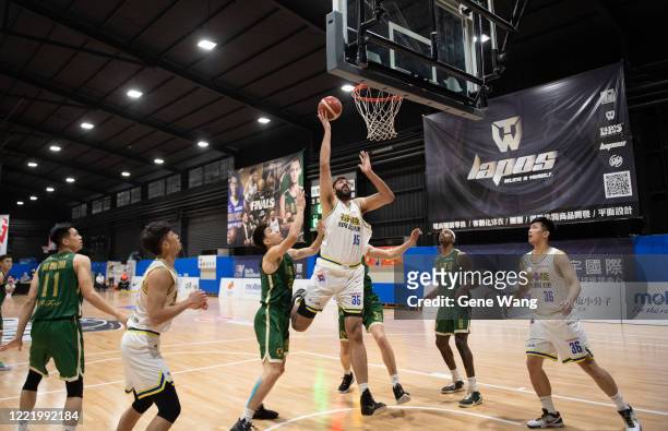 Sim Bhullar of Yulon Luxgen Dinos attempts the basket during the SBL Finals Game Six between Taiwan Beer and Yulon Luxgen Dinos at Hao Yu Trainning...