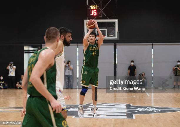 Hao Chi Wang attempts 3 point shot during the SBL Finals Game Six between Taiwan Beer and Yulon Luxgen Dinos at Hao Yu Trainning Center on April 30,...