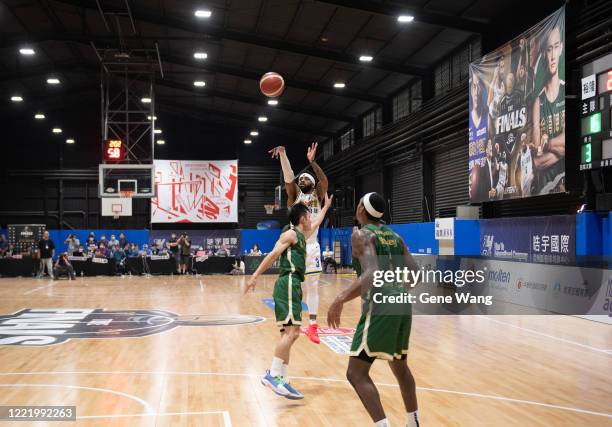 Marcus Keene of Yulon Luxgen Dinos attempt 3 point shot during the SBL Finals Game Six between Taiwan Beer and Yulon Luxgen Dinos at Hao Yu Trainning...