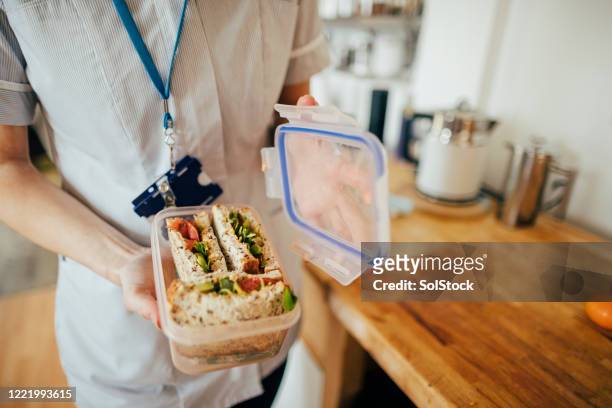 keeping her immune system strong - packed lunch stock pictures, royalty-free photos & images