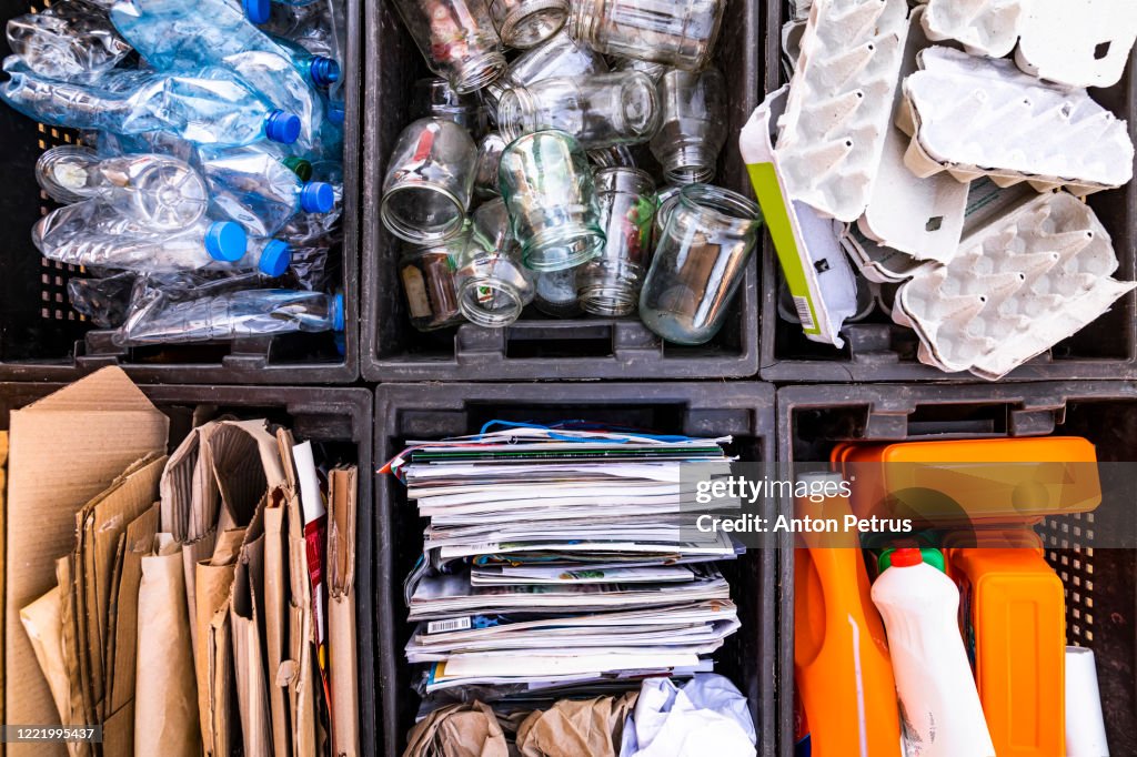 Boxes with Separate collection of waste for recycling.