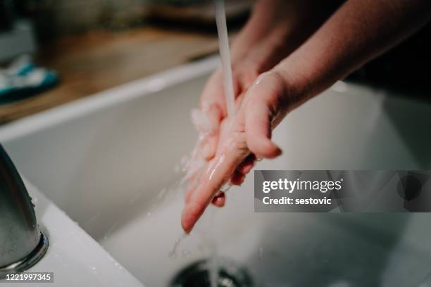 washing hands coronavirus concept - child washing hands stock pictures, royalty-free photos & images