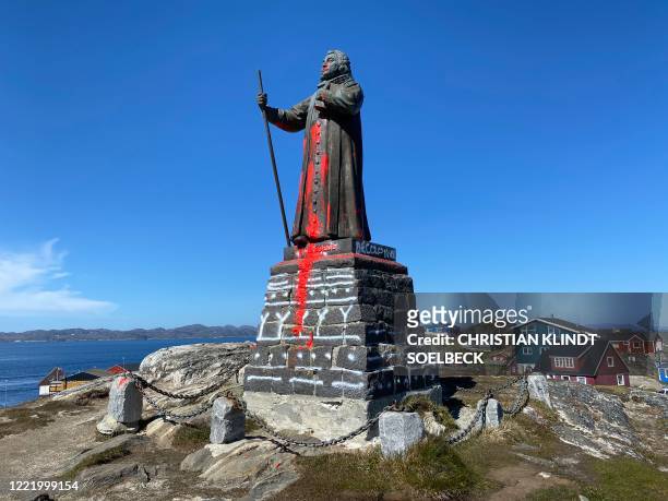 The Statue of Dano-Norwegian Lutheran missionary Hans Egede is seen in Nuuk, Greenland on June 21 after being vandalized with red paint. - He...