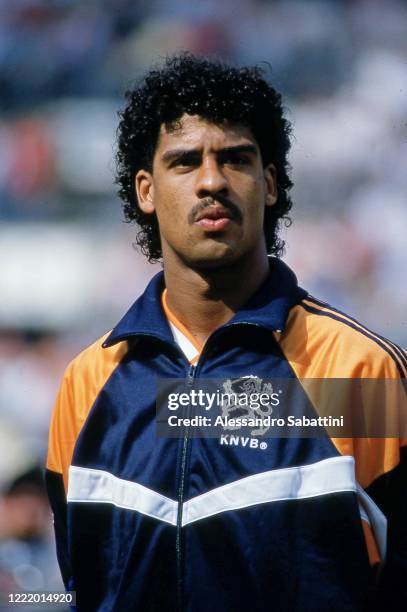 Frank Rijkaard of Netherland looks on.