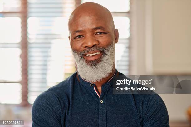 retirement looks good on me - bald black man with beard stock pictures, royalty-free photos & images