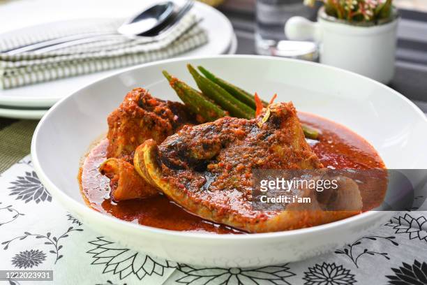 traditional dishes stingray - called asam pedas. it is called dishes among malaysians. - ray fish stock pictures, royalty-free photos & images