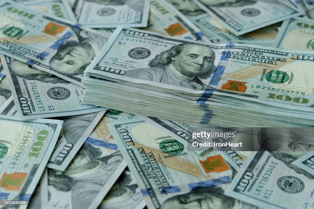 Stacking of US Dollar bank notes.