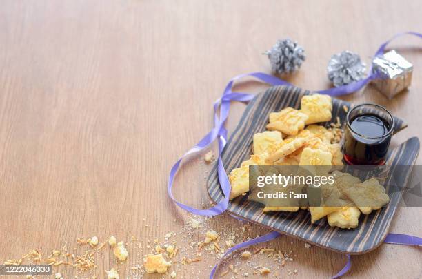 Cheese Cookies Or Biskut Keju On The Wooden Plate And Background High-Res Stock Photo