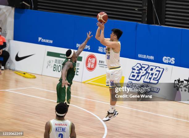 Yi Hui Lin of Yulon Luxgen Dinos attempts to jump shot during the SBL Finals Game Six between Taiwan Beer and Yulon Luxgen Dinos at Hao Yu Trainning...