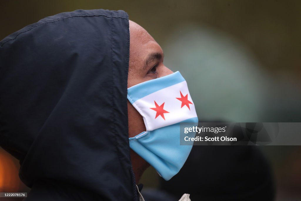 Masks Placed On Chicago Landmarks Before New Law Mandating Face Coverings Takes Effect