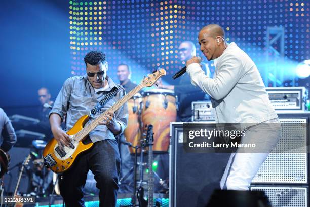 Max Santos and Anthony Santos of Aventura perform at Hard Rock Live! in the Seminole Hard Rock Hotel & Casino on July 6, 2010 in Hollywood, Florida.